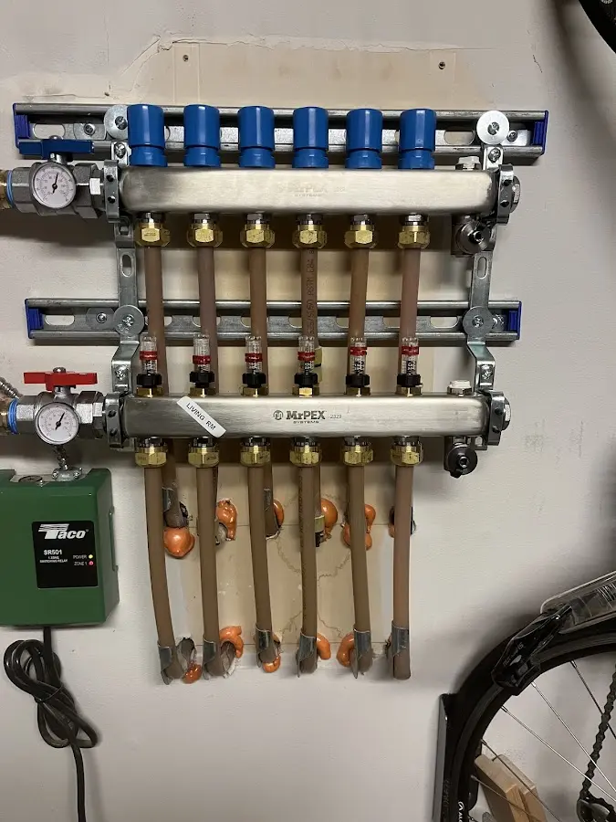 Plumber performing Leak Detection at a residential property in Whitmore Village